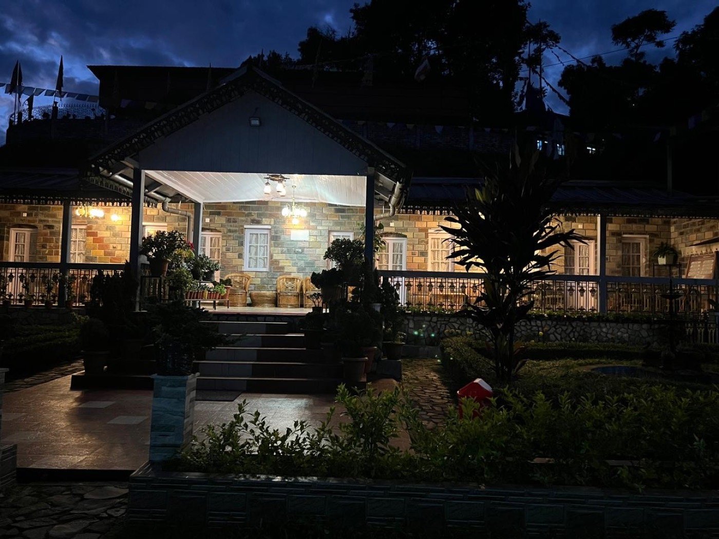 Saino Heritage Bungalow illuminated in the evening